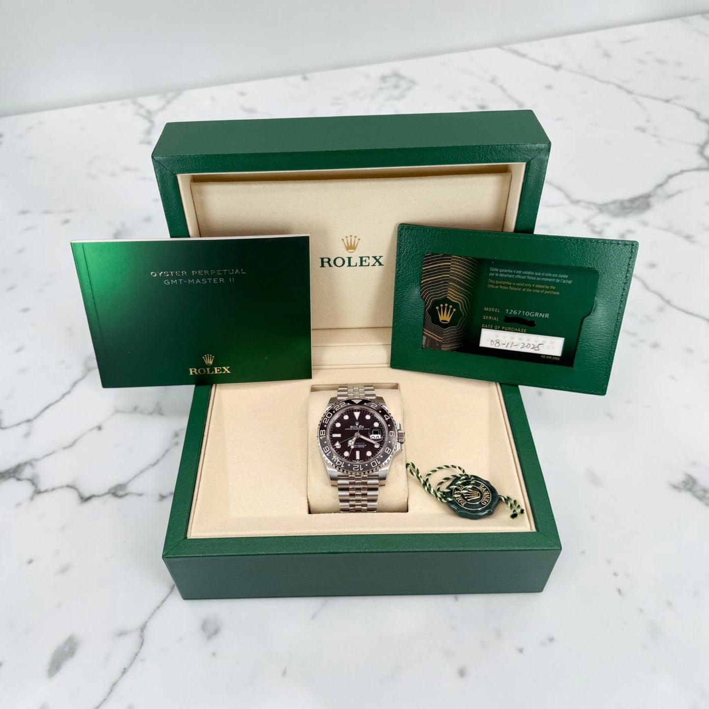 Rolex GMT-Master II “Bruce Wayne” –126710GRNR